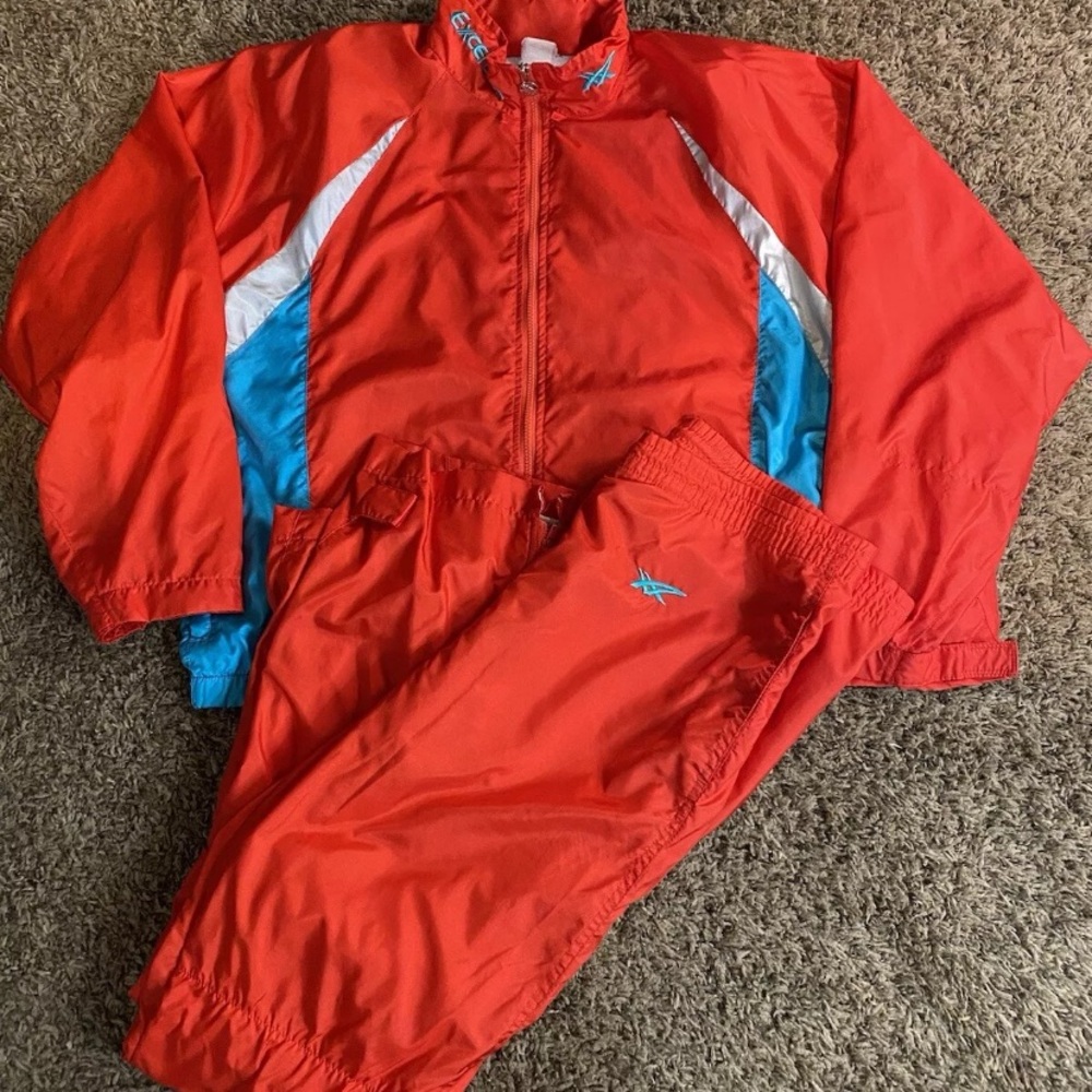 Red Exceltech Jacket with Blue Accents